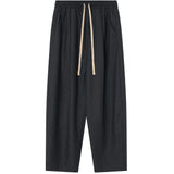 SEVA MONT WOOL RELAXED TAPERED PANT - BLACK